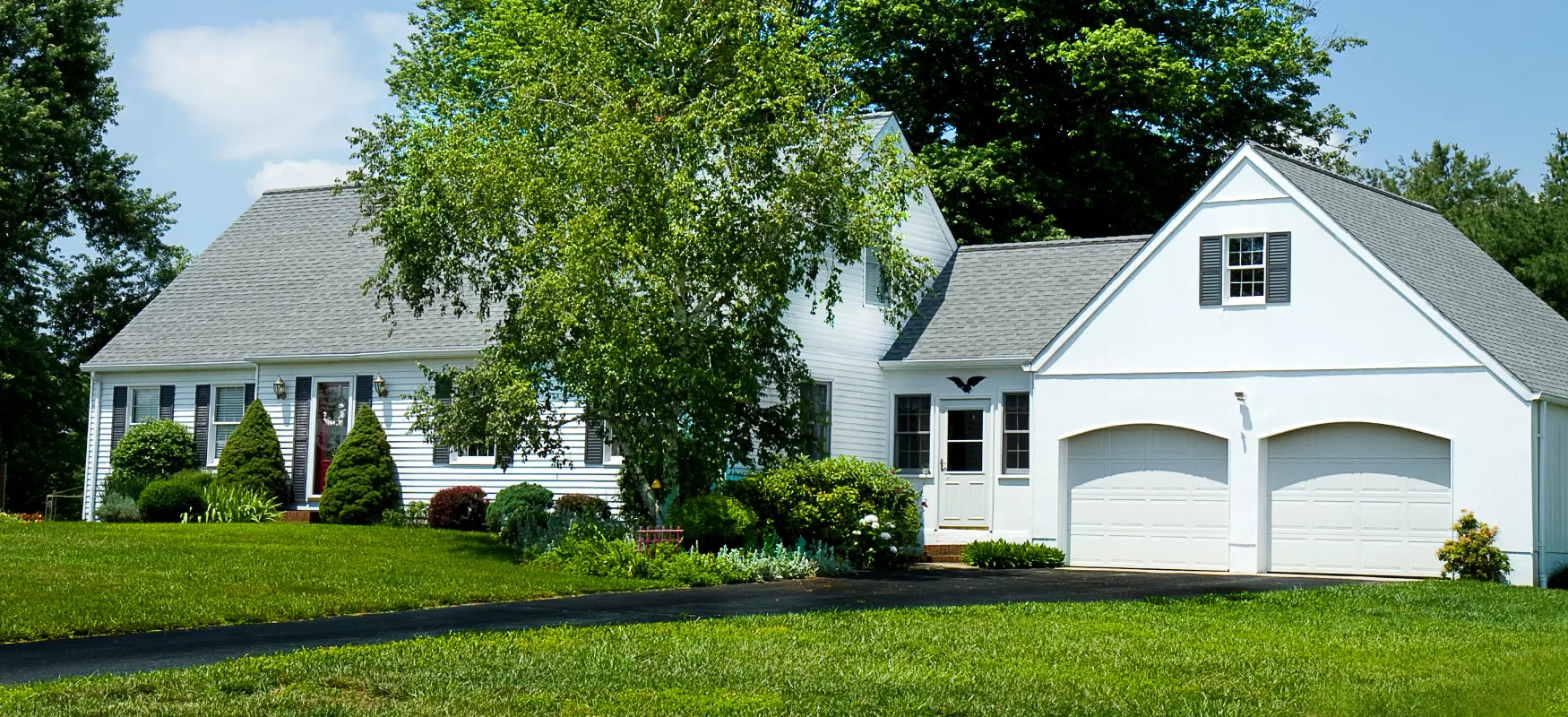 White Sided House With Garage Photo